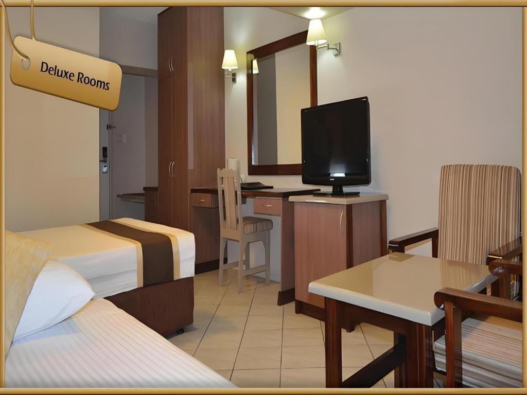Peninsula International Hotel Сува Экстерьер фото
