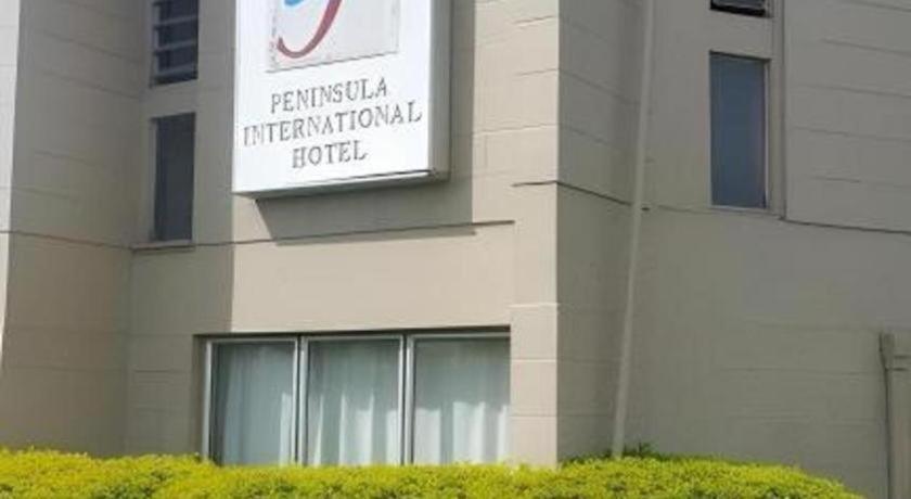Peninsula International Hotel Сува Экстерьер фото