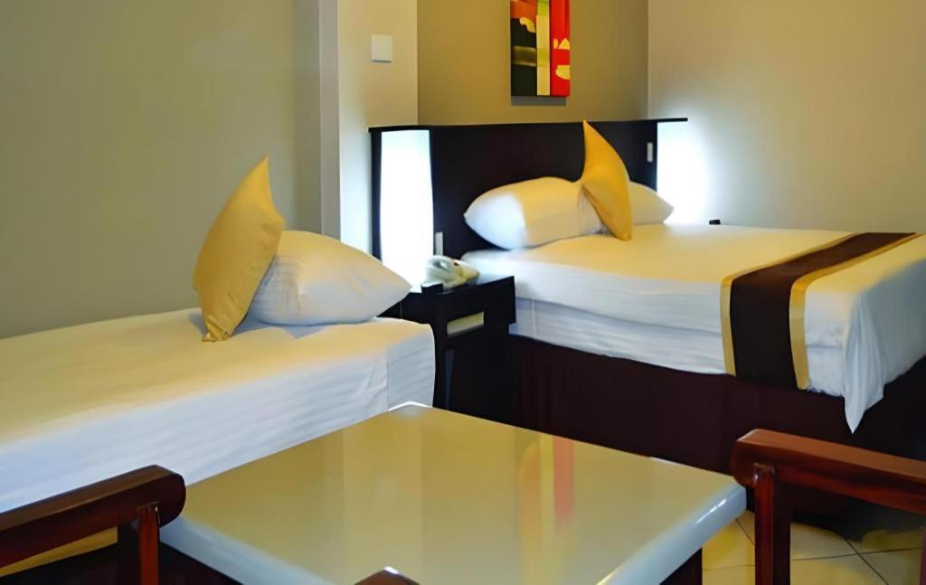 Peninsula International Hotel Сува Экстерьер фото
